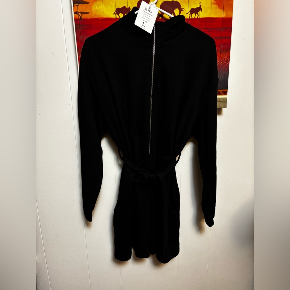Black Long Sleeve Romper with Belt and pockets NWT